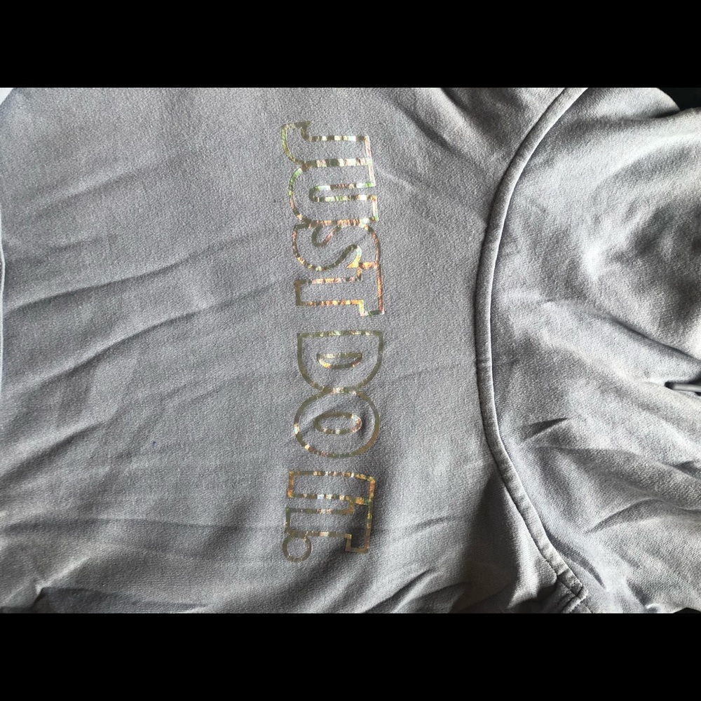 NIKE cowl neck hoodie with front pocket. Logo is chrome prism. Non smoking home.